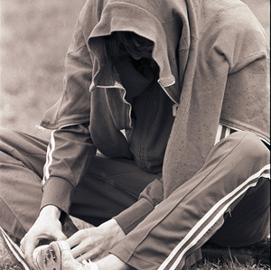 Stretching at Track meet, circa 1969 - 1975