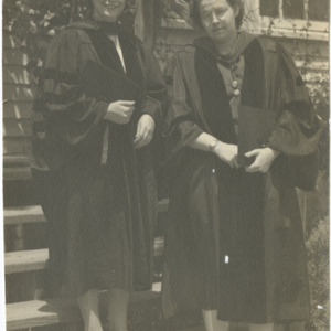 Mary Yarbrough and another woman in graduation robes, 1946