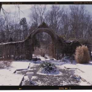 Arched garden structure in the snow, Montrose garden, February 1996