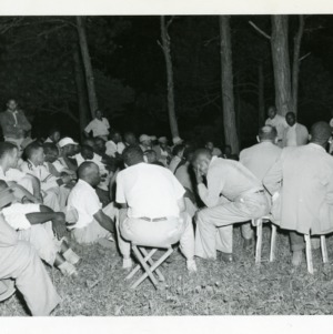 Photo of Men at an Outdoor Gathering