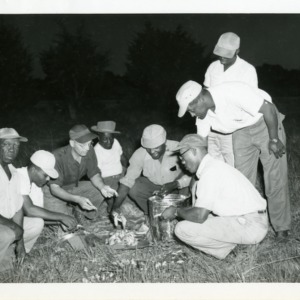 Photo of Men Being Instructed with Cooking