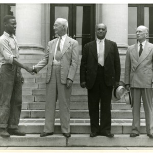 Photo of F.D. Bluford with Men on Steps