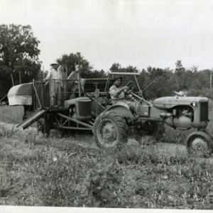 Photo of Men on Allis Chalmers Tractor