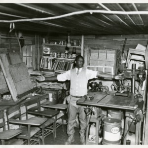 Photo of Man in Workshop