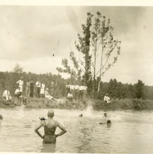 Photo of Men Hanging Out at a Lake