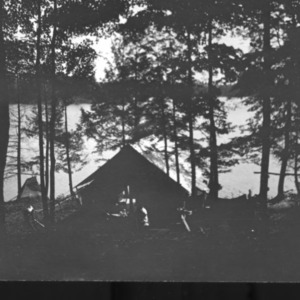 Camp set up next to a lake