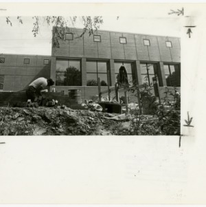 Laying bricks by the "Link Building," now known as Caldwell Hall