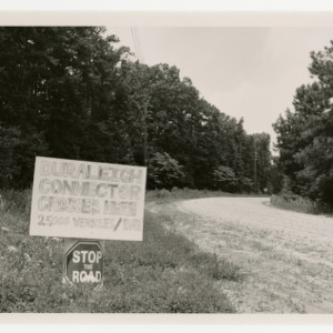 Sign protesting the Duraleigh Connector through Schenck Forest