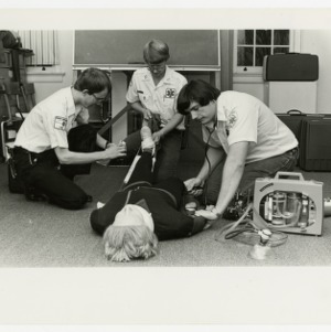 Emergency service workers train on a dummy