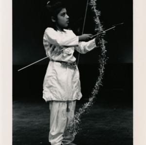 Young archer performs as the daughter in "The Lost Ring of Shakuntala"