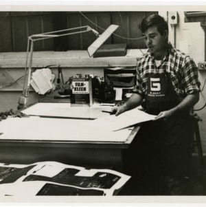 Student works at old print shop
