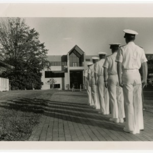 Navy ROTC drill practice in front of the Student Center Annex
