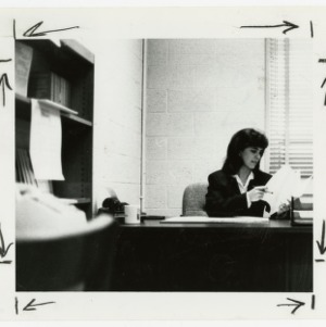 Student sits at desk at Senior Council Headquarters