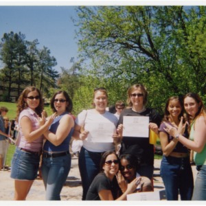 Theta Nu Xi Mutilcultural Sorority poses with their awards at the Order of Omega Awards Ceremony
