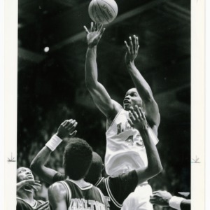 A jumpshot by NC State's basketball player number forty-three