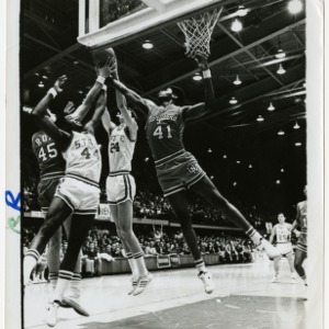 David Thompson and Burleson under the net against Maryland