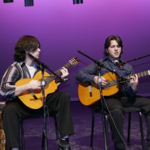 Guitar duet on stage for "Somos... Estrellas" event