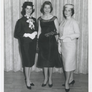 Three Women in Formal Attire