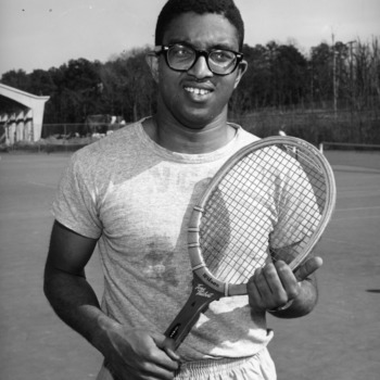 Irwin Holmes on tennis court