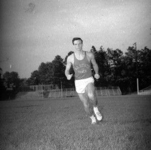 Ron Sicoli running in field
