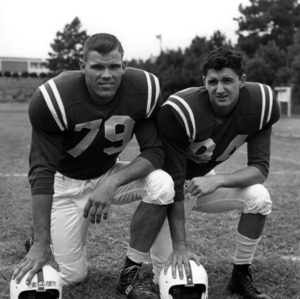 Football players Dave Ellis and Dennis Romesburg
