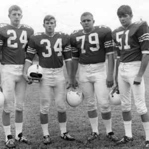N. C. State football players Mike Adamczyk, Pat Kenney, Bill Yoest, and Larry McTigue