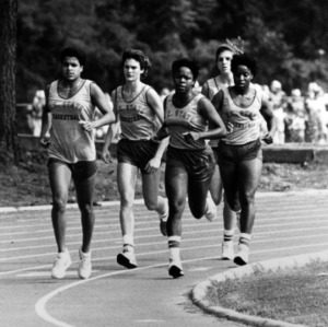 N. C. State Women's Basketball team conditioning at the track