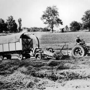 Agricultural machinery harvesting alfalfa