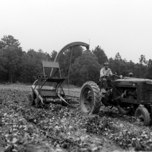 Vine Row harvesting machinery on tractor