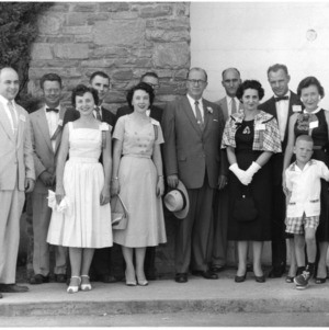 Group photograph including Dean H. Brooks James
