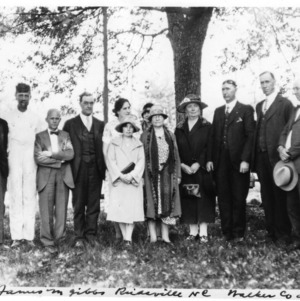 Group photograph of beekeepers at apiary of James M. Gibbs