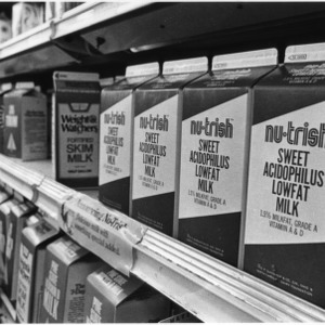 Grocery store shelf of sweet acidophilus lowfat milk