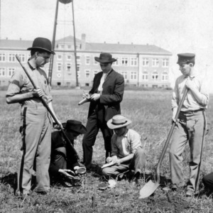 Men examining ground