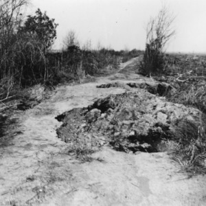 Holes in road after fire