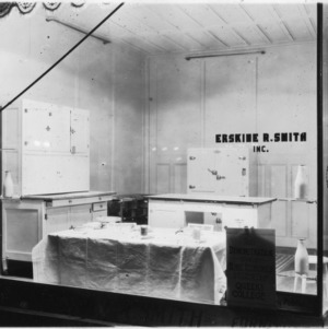 Storefront window display at Erskine R. Smith, Inc. Furniture store, Part of promotional milk campaign