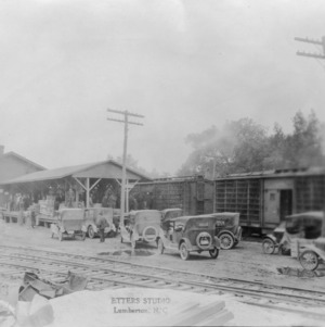 Two views of poultry car shipment, Robeson, 1925
