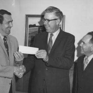 Southern Bell Telephone Company Presents Check to State 4-H Leader Chester D. Black