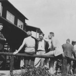 Group on porch of Pisgah Inn during session of the American Forestry Association