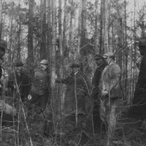 Farmers attending a forest meeting and timber thinning demonstration at the farm of R.L. Barr, Beaufort County