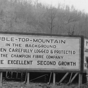 Billboard sign notifying logging of Double-Top-Mountain