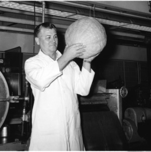 Dr. Maurice Hoover examining pumpkin