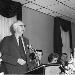 Man at Farm Press, Radio, and Television Institute Meeting
