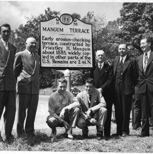 Group in front of Magnum Terrace historical marker