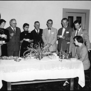 Group at refreshments table, Farm Press and Radio Institute