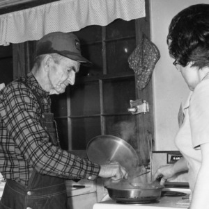 Man and woman cooking