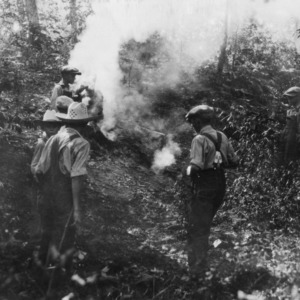 Rown Cunty Club Boys oveserving the work of a "forest fire" on High Rock Mountain July 20th, 1926