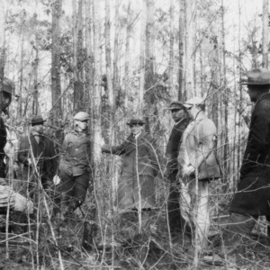 Farmers at timber thinning demonstration on farm of R. L. Barr