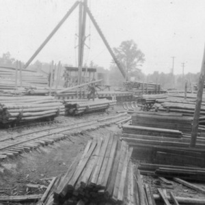 Pine telephone poles in yard of the North State Creosoting Company