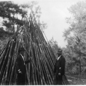 J. H. Frye and other at farm woodlot thinning demonstration