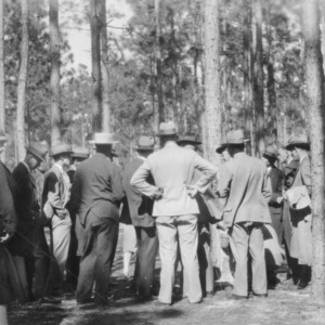 Foresters and timber owners studying turpentine experiment
